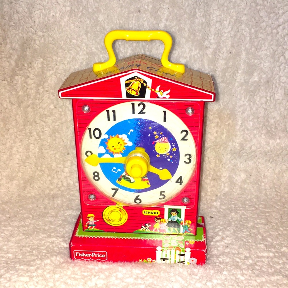 Fisher price box teaching clock